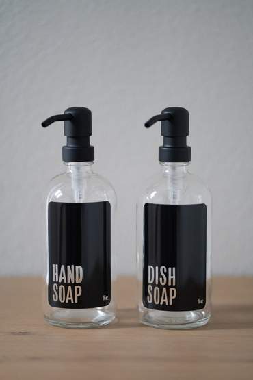 https://urbanember.com/cdn/shop/products/CLMOBLHSBP-CLMOBLDSBP-clear-glass-modern-black-hand-soap-dish-soap-black-metal-pump_grande.jpg?v=1613591640