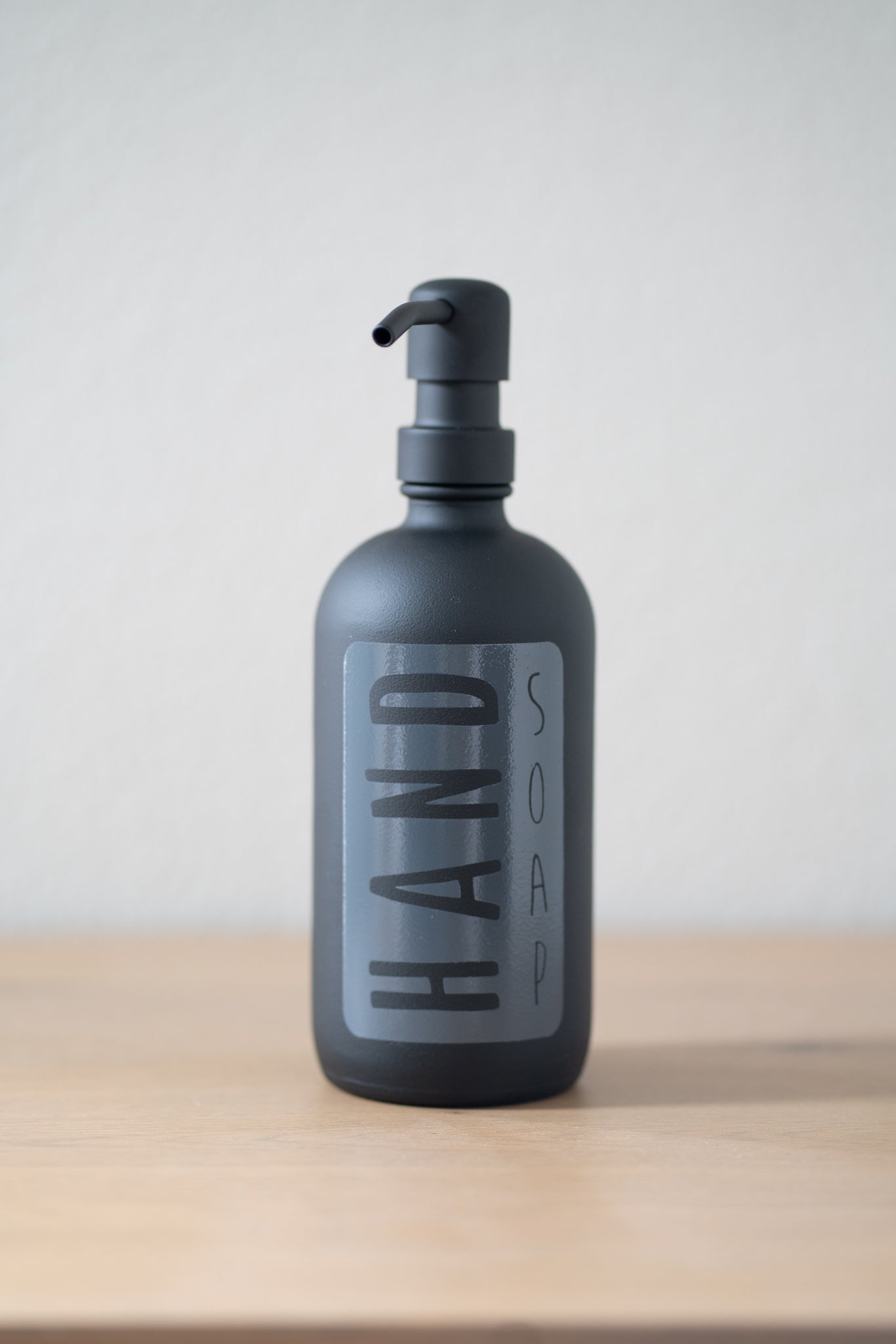 Matte black hand soap bottle