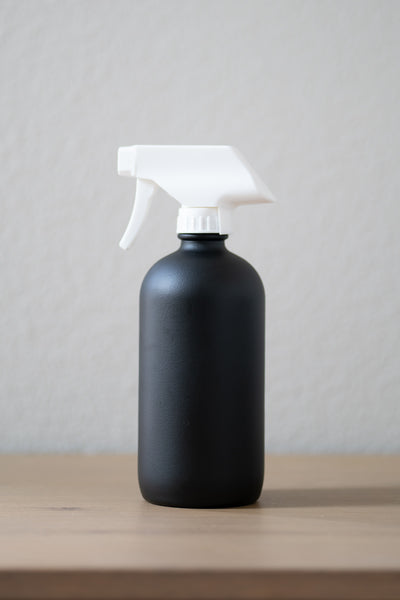 Matte Black refillable spray bottle with white sprayer