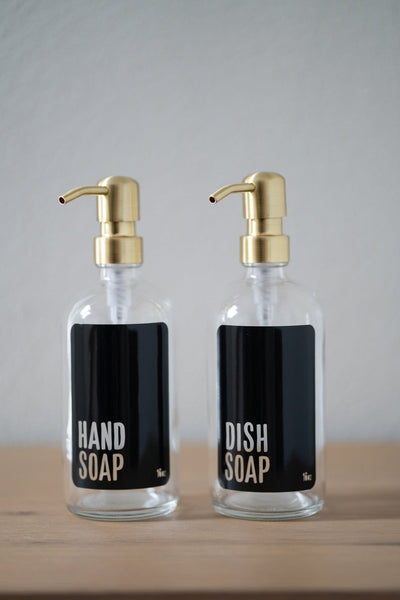 Clear Glass with black soap bottles with gold metal pumps